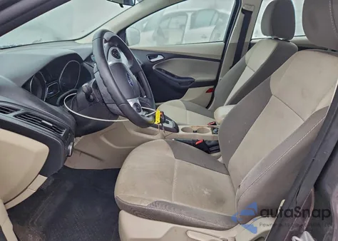 2014 Ford Focus Se z USA, uszkodzony, nr VIN 1FADP3F24EL128891